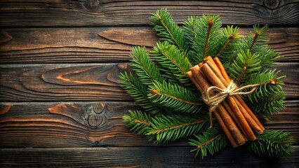 Aromatic Bundle of Cinnamon Sticks Adorned with Fresh Evergreen Branches on Rustic Wooden Surface