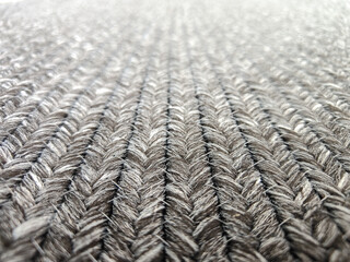 Detail of hand-woven natural fiber rug, rug concept