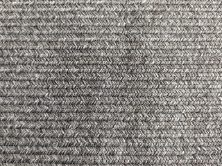Detail of hand-woven natural fiber rug, rug concept