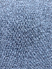 Detailed macro shot of woven blue textile, textile concept