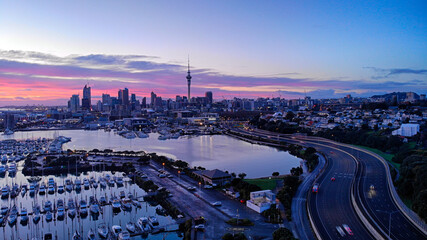 Aerial photo of Auckland Harbour, city and yachts at sunset