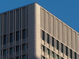 Obraz premium Tokyo, Japan - February 27, 2025: Windows of building in Tokyo