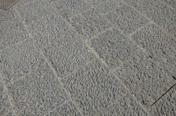 sidewalks and a square made of volcanic stone in Catania, Sicily	