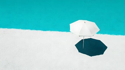 white beach umbrella on turquoise water