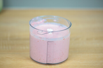 Protein berry shake in the kitchen, concept of diet and healthy eating