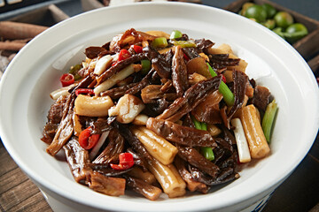 Stir-fried pork belly with garlic, rice pepper, pine mushroom and thick vermicelli