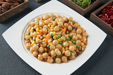 Fried sesame balls with corn and green beans