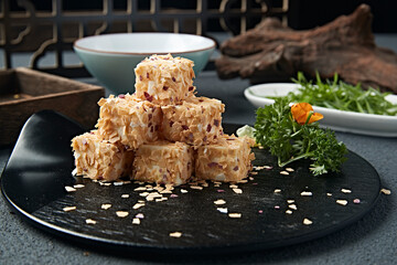 Silky almond cake wrapped in sweet oatmeal crumbs