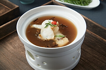 Abalone stewed with bamboo fungus in a thick soup