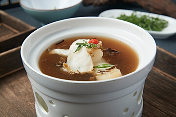 Abalone stewed with bamboo fungus in a thick soup
