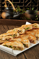 Ham and green radish stuffed pancakes