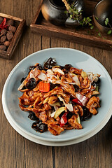 Spicy and sour pepper, black fungus and green onion, fried pork