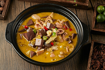 Claypot Sour Soup with Curd and Blood Wonton