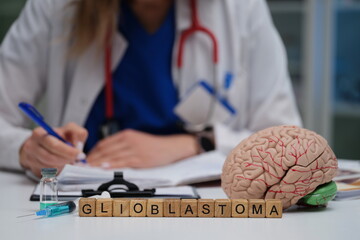 A doctor conducts an indepth study of glioblastoma using an advanced brain model alongside various...