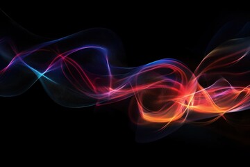 Fototapeta premium Colorful flowing lines of light across a black background