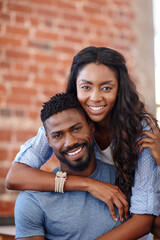 Obraz premium Black couple, hug and safety in happy portrait, weekend date and together for romantic partnership. Embrace, people and trust commitment in relationship, connect and support boyfriend with care