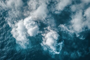 Obraz premium Wispy clouds dance above vibrant ocean waves during a serene midday in a coastal paradise. Generative AI