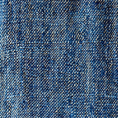 Close-up of blue denim jeans fabric texture background