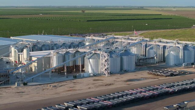 Aerial view of industrial sized stainless steel storage tanks