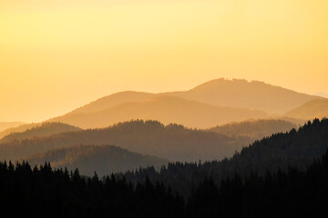 Golden Hour Mountain Range Silhouette. A breathtaking landscape view of a mountain range at sunrise or sunset.  Best nature photo world 