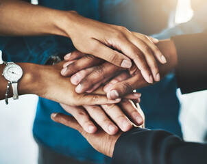 Teamwork, office and hands of business people in stack for support, collaboration and solidarity. Professional, corporate and closeup of workers together for agreement, company growth and partnership