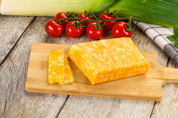 Marble yellow cheese with slices