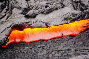 Active lava flows over old lava field in Hawaii