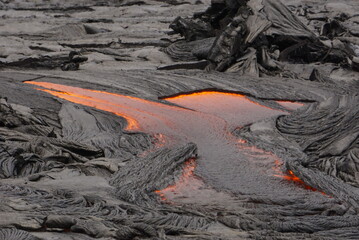 Active lava flows over old lava field in Hawaii
