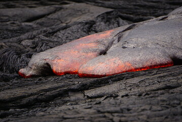 Active lava flows over old lava field in Hawaii