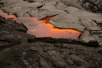 Active lava flows over old lava field in Hawaii