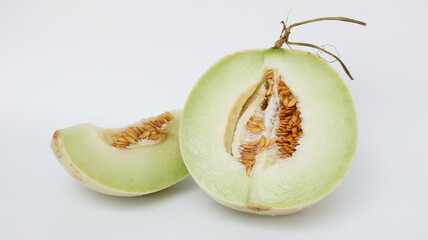 Cantaloupe melon cut in half isolated on white background, Green melon