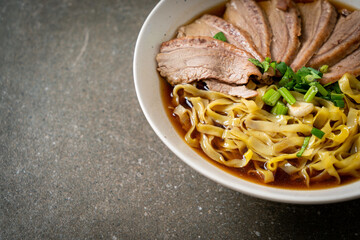 egg noodles with stewed duck in brown soup