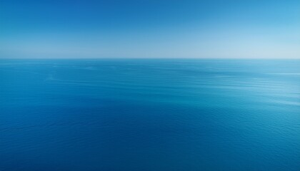 Fototapeta premium Smooth gradient: deep blue to light teal evokes ocean tranquility. Calming & fluid color wash. Ideal for serene backgrounds & ocean-themed designs.