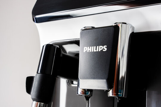 Close-up of Philips coffee machine spout in a modern kitchen