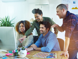 Computer, pointing and smile with business people in office for planning or project management....