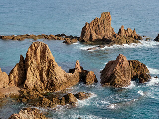 Sirens Reef in Cabo de Gata-Níjar. A set of volcanic rocks emerging from the water located in the heart of Cabo de Gata in Almería