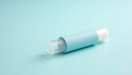 Fototapeta premium Nasal Stick. Blue inhaler medical device on light background for healt