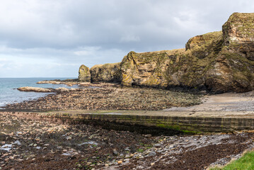 View of the Brough Bay near Brough village, Scotland's most northerly mainland village, Caithness, United Kingdom. Coastal scenery near Brough.