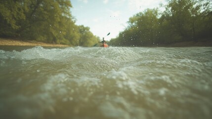 Kayaker navigates tranquil waters surrounded by lush greenery an