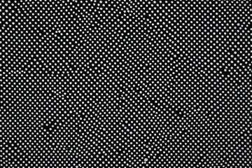 a close up of a black and white polka dot pattern