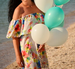 young woman with balloons