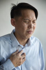 middle aged old asian man with GERD reflux sickness, breathing difficulty, long covid reinfection