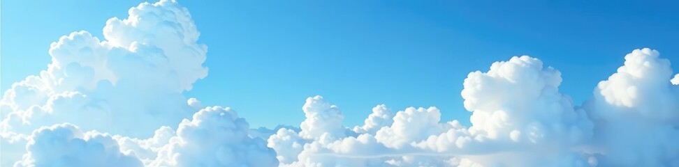 Soft white clouds drift lazily across a brilliant blue sky, serene, peaceful, expansive