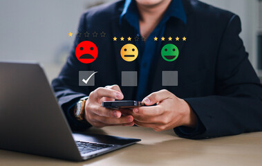 Customers choose a 1-star rating in a survey on a virtual touchscreen on a smartphone and their dissatisfaction, customer feedback and comments, negative customer experiences with the service.