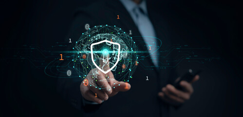 Digital shield protecting online data and networks concept with futuristic cyber defense technology. Secure authentication system ensuring privacy and encryption against cyber threats
