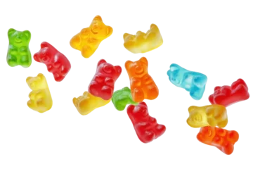 Fototapeten Flying jelly gummy bears on transparent background © Link Parker