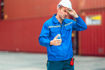 Container Worker Hydrating on the Job