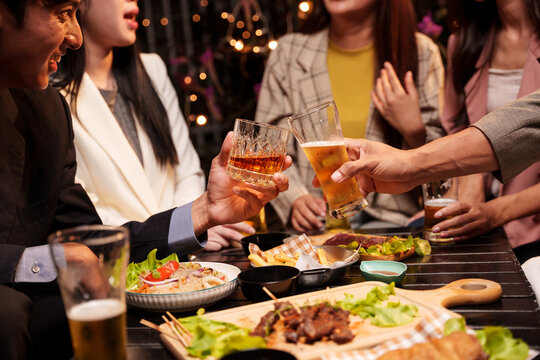 Group of people meeting for drinks Celebrate and show each other good genes happily.