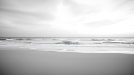 Fototapeta premium black and white photograph, serene beach landscape, gentle waves, empty shoreline, overcast sky, minimalist composition, calm ocean, tranquil atmosphere, grainy texture, soft focus, monochrome aesthet