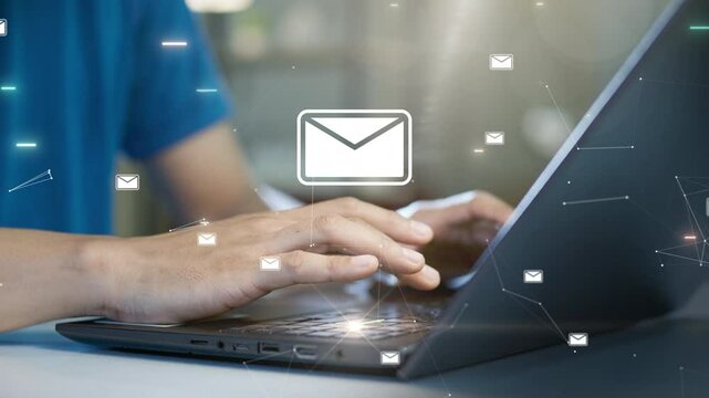 Close-up of hands typing on a laptop keyboard with floating email icons and a notification symbol. Concept of digital communication, online messaging, and email notifications.